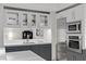 Stylish kitchen with stainless appliances, contrasting cabinets, and modern lighting at 2700 Las Vegas Blvd # 1202, Las Vegas, NV 89109