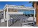 Chic outdoor seating area with pergola, offering a relaxing resort lifestyle at 2700 Las Vegas Blvd # 1202, Las Vegas, NV 89109