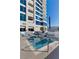 Tranquil plunge pool with lounge chairs and shade structures, offering a serene escape from the city's hustle at 2700 Las Vegas Blvd # 1202, Las Vegas, NV 89109