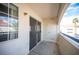 View of the private balcony with door and screen window at 2725 S Nellis Blvd # 2045, Las Vegas, NV 89121