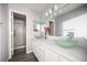 Bathroom showcasing glass vessel sinks and tile floors at 2725 S Nellis Blvd # 2045, Las Vegas, NV 89121