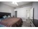 Bedroom with wood-look floors and ensuite bathroom at 2725 S Nellis Blvd # 2045, Las Vegas, NV 89121