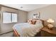 Comfortable bedroom featuring a large window, plush bedding, and ample natural light at 280 Pear Meadow St, Henderson, NV 89012