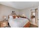 Cozy bedroom with comfortable bed, decorative pillows, and stylish bedside tables at 280 Pear Meadow St, Henderson, NV 89012