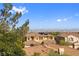 A stunning cityscape view of Las Vegas highlights mature trees and beautiful roofs at 320 Lorelei Rock St, Las Vegas, NV 89138