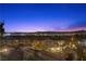 Spectacular sunset view over the city from residential neighborhood at 320 Lorelei Rock St, Las Vegas, NV 89138