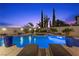 Sparkling blue pool and spa with deck chairs at 320 Lorelei Rock St, Las Vegas, NV 89138