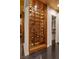 Custom wine rack featuring glass doors and wood construction at 320 Lorelei Rock St, Las Vegas, NV 89138
