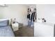 Cozy bedroom features carpeted floors, closet space with visible clothing and storage options at 3221 Yolanda Ln, Las Vegas, NV 89121