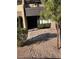 Charming home exterior featuring mature trees, inviting front entrance, and landscaped pathway at 3221 Yolanda Ln, Las Vegas, NV 89121