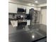 Modern kitchen featuring stainless steel appliances, sleek countertops, and ample cabinet space at 3221 Yolanda Ln, Las Vegas, NV 89121