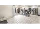 Bright kitchen and breakfast bar with stainless steel appliances and sliding patio doors at 3221 Yolanda Ln, Las Vegas, NV 89121