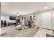 Cozy living room featuring modern furniture, ceiling fan, and a large window at 3221 Yolanda Ln, Las Vegas, NV 89121