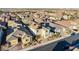Aerial view of a residential neighborhood showcasing well-maintained homes, landscaped yards, and tree-lined streets at 352 Dandelion Brook Ct, Las Vegas, NV 89148