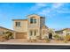 Charming home featuring a two-car garage, welcoming courtyard, and manicured landscaping at 352 Dandelion Brook Ct, Las Vegas, NV 89148