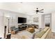 Cozy living room boasts a ceiling fan and plantation shutters at 352 Dandelion Brook Ct, Las Vegas, NV 89148