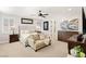 Relaxing main bedroom with sitting area, ceiling fan and plantation shutters at 352 Dandelion Brook Ct, Las Vegas, NV 89148