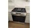 Close-up of a stainless steel oven with a stovetop, enhancing the modern kitchen's functionality at 362 Legacy Dr, Henderson, NV 89014