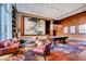 Spacious game room with a pool table, lounge seating, and unique art, perfect for relaxation and entertainment at 3750 Las Vegas Blvd # 2711, Las Vegas, NV 89158