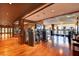 Spacious gym features cardio equipment, a TV, wood floors, and ample light at 3750 Las Vegas Blvd # 2711, Las Vegas, NV 89158