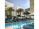 Inviting pool area with shaded cabanas and comfortable lounge chairs for relaxation and enjoyment at 3750 Las Vegas Blvd # 2711, Las Vegas, NV 89158