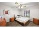 Comfortable bedroom featuring a queen-size bed, ceiling fan, and carpeted floors at 4592 Cabo Ln, Las Vegas, NV 89121