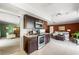 Well-lit kitchen area showcasing stainless steel appliances and a view of the adjacent living space at 4592 Cabo Ln, Las Vegas, NV 89121