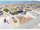 Aerial view shows a single-story house with solar panels, desert landscaping, and a two-car garage at 4910 Marywood Ct, Pahrump, NV 89061