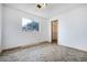 Bedroom with tile floors, closet, and large window at 516 Tabony Ave, Henderson, NV 89011