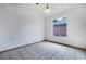 Empty bedroom with tile flooring and large window for natural light at 516 Tabony Ave, Henderson, NV 89011