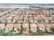 Aerial view of a residential neighborhood with well-maintained homes and lush landscaping at 5615 Believe Ct, Las Vegas, NV 89139
