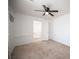 Neutral bedroom featuring a ceiling fan and carpet, providing a simple design and comfortable space at 5615 Believe Ct, Las Vegas, NV 89139