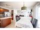 Spacious kitchen with stainless steel appliances and view of the living room at 5615 Believe Ct, Las Vegas, NV 89139