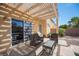 Comfortable outdoor seating area with a pergola, perfect for relaxing and entertaining at 5615 Believe Ct, Las Vegas, NV 89139