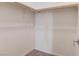 The closet in this home offers ample storage space with double rods for hanging clothes at 6833 Wispy Sky Ct, Las Vegas, NV 89142