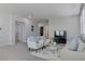 Upstairs living room with great seating and bright light at 6833 Wispy Sky Ct, Las Vegas, NV 89142