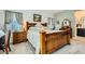 Cozy primary bedroom featuring a wood bed frame, and carpet flooring at 7308 N Decatur Blvd # 1, Las Vegas, NV 89131