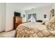 Bright, comfy bedroom with neutral walls, carpet flooring, and soft natural light at 7308 N Decatur Blvd # 1, Las Vegas, NV 89131