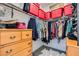 Organized walk-in closet with ample storage, clothing racks, and a dresser, maximizing space at 7308 N Decatur Blvd # 1, Las Vegas, NV 89131