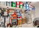 Organized garage with shelving, tool chest, refrigerator and ample storage space at 7308 N Decatur Blvd # 1, Las Vegas, NV 89131