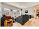 Bright living room boasting comfortable sofas, decorative accents, and ample natural light from multiple windows at 7308 N Decatur Blvd # 1, Las Vegas, NV 89131