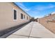 This home has a long driveway leading to a private gate, adding security and privacy at 7420 Zonal Ave, Las Vegas, NV 89131