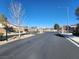 Gated community entrance with well-maintained landscaping and a secure access point at 7420 Zonal Ave, Las Vegas, NV 89131