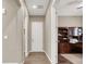 Hallway leading to a bedroom and an office with built-in shelving at 7420 Zonal Ave, Las Vegas, NV 89131