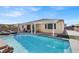 Sparkling pool with a spa, sun loungers, and a covered patio offering an ideal outdoor living space at 7420 Zonal Ave, Las Vegas, NV 89131
