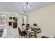 Bright dining area off living room, featuring views to kitchen and out to the balcony at 745 N Royal Crest Cir # 158, Las Vegas, NV 89169