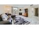 Bright living room with marble floors, fireplace and balcony access at 745 N Royal Crest Cir # 158, Las Vegas, NV 89169