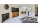 Living room with fireplace, TV, and views into the dining area at 745 N Royal Crest Cir # 158, Las Vegas, NV 89169
