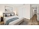 Comfortable bedroom with a cozy bed, side tables, and neutral decor, offering a relaxing atmosphere at 7554 Violet Vista Ave # 201, Las Vegas, NV 89130