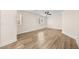 This bedroom features new floors, fresh paint, a ceiling fan, and two windows at 7554 Violet Vista Ave # 201, Las Vegas, NV 89130
